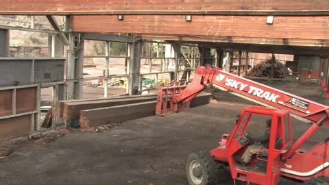 Telehandler Moving Wood Beams at Deconstruction Site in Bonner Stock Footage 134204635