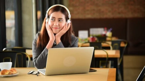 Telemarketting callcenter agent using headphone talk with customer client. Call  Stock Footage 123710937