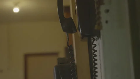 Telephone Hanging On Wall In Prison Stock Footage 208751600