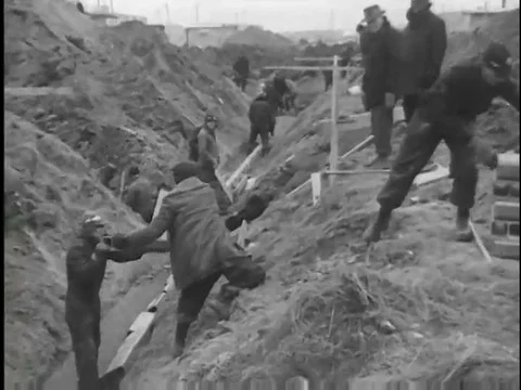 Telephone lines are installed for the army b the Network Bell company in theƒ Stock Footage 75269847