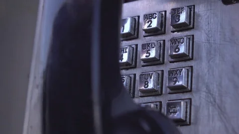 Telephone number dialed at outdated payphone 4k 库存影片 72957428