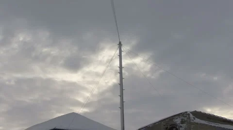 Telephone pole coated in wind-blown snow. Video stock 1090801