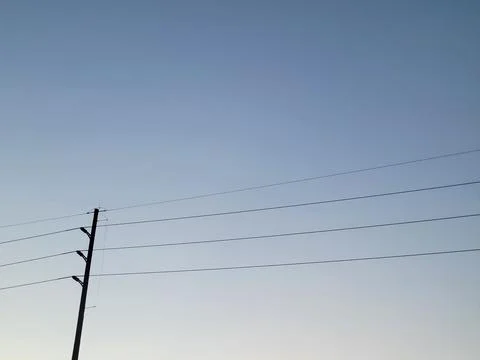 Telephone Pole During Sunset Stock Photos