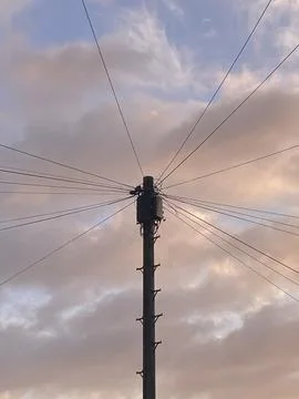 Telephone pole with morning sky Stock Photos