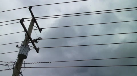 Telephone Pole over Dark Clouds Stock Footage 68945682