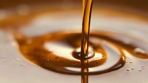 Telephoto close up Slow motion of falling drop into coffee with camera motio Stock Footage 285338512