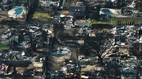 Telephoto drone shot of fire devastation in Altadena, wildfire aftermath in LA Stock Footage 302227926
