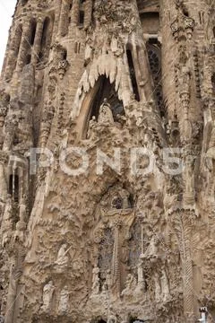Telephoto shot of a Facade of the Sacred Family Temple Church (sagrada Familia) Stock Photos