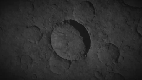 A telescope approaches the details of the moon's surface Stock Footage 289763273