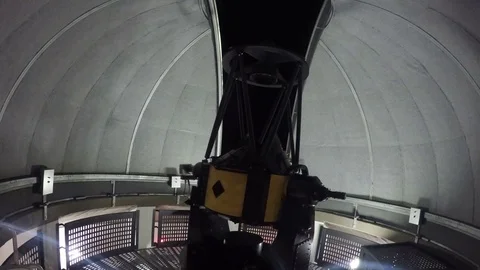 Telescope moving inside the dome of an observatory. Stock-Footage 81189494