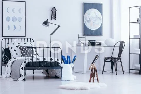 Telescope in teenager's bedroom Stock Photos