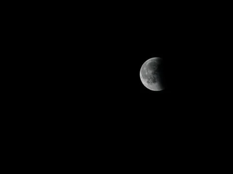 Telescope view of the partial moon eclipse Stock Photos