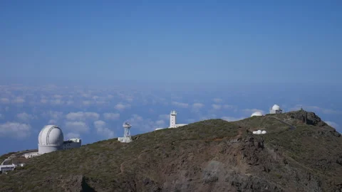 Telescopes of the Roque de Los Muchachos Astrophysical Observatory above the Stock Footage 317539842