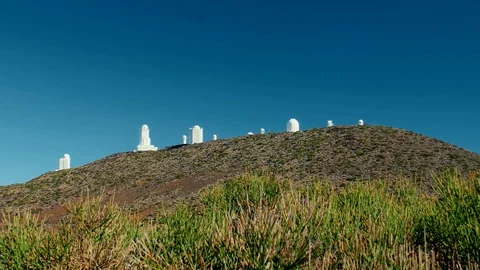 Telescopes of the space observatory on the hill of a high mountain volcano Video stock 119945047