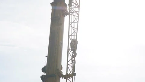 Telescopic boom of a construction crane Stock Footage 263980087