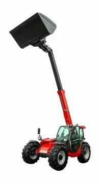 Telescopic handler lifting a large bucket in an agricultural field during d.. 스톡 사진