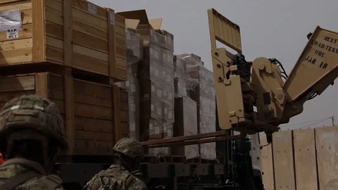 Telescopic handler loading wooden crates Stock Footage 87826033