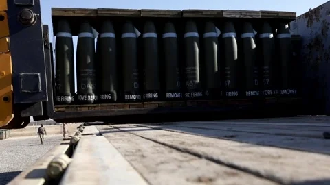 Telescopic handler loads crate of ammunition onto truck at Al Asad Air Base Stock Footage 168740860