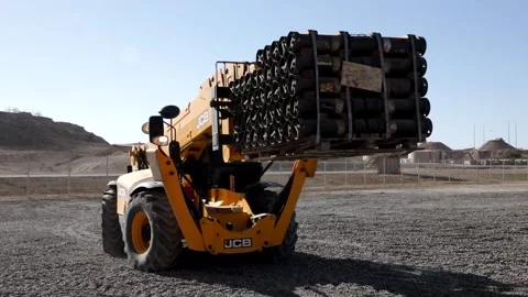 Telescopic handler moving pallet of ammunition at Al Asad Air Base Stock Footage 168740778