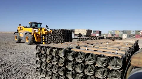 Telescopic handler reversing with pallet of ammunition at Al Asad Air Base Stock Footage 168740802