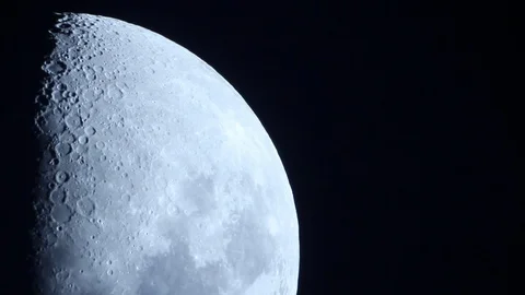 Telescopic view of the Moon gently gliding through the night Stock Footage 91746905