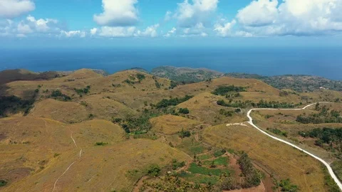 Teletubbies Hill View to The Sea. Drone Shot Tropical Savanna Hills Stock Footage 113991149
