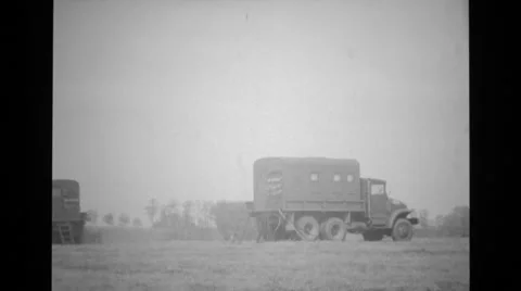 Teletypewriter terminal group trucks halting in the field Stock Footage 37593278