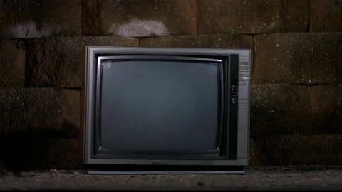 Television being broken by an axe in slow motion Stock Footage 81214679