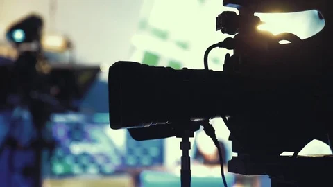 Television camera close-up in news studio Stock Footage 76400472