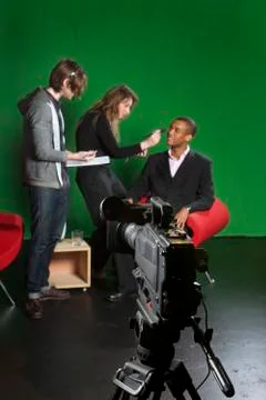 Television camera on tripod in studio Stock Photos