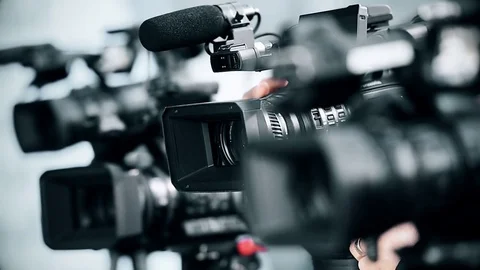 Television cameras in a row broadcasting a live media event 스톡 동영상 73684256