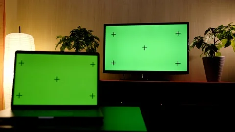 Television computer green screen TV and Computer green screen living room Stock Footage 124929755