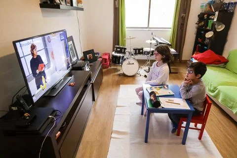 Television lessons temporarily replace presential lessons, Coimbra, Portugal - 2 Stock Photos