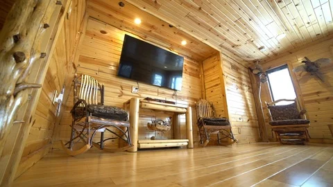 The television in the log house Stock Footage 103955934