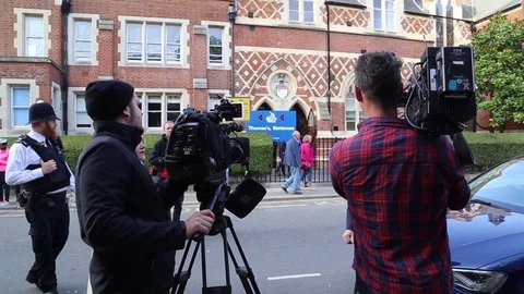 Television news crews outside Prince George's first day at school, London UK Stock Footage
