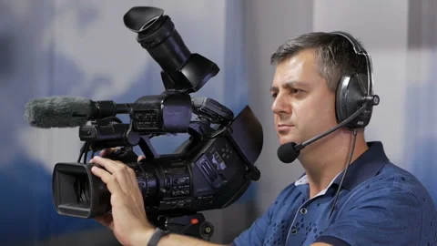 The television operator in the process of shooting the TV program. Stock-Footage 94816277