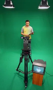 Television presenter on green screen Stock Photos