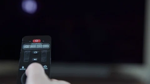 Television remote control remotely via a TV remote control, switching program Stock Footage 121769548