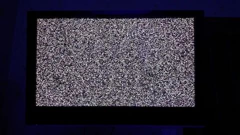 Television Screen Displaying Static Noise in Dark Room Stock Footage 304331163