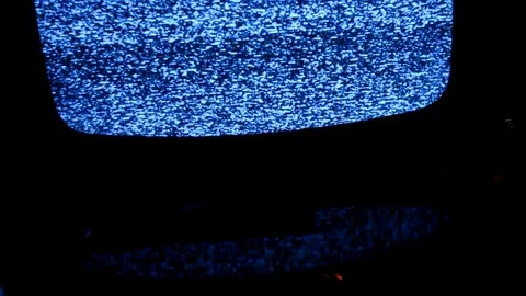 Television static reflected in shiny black surface Stock Footage 84899991