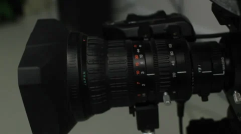 Television studio camera lens jib down Stock Footage 34643352