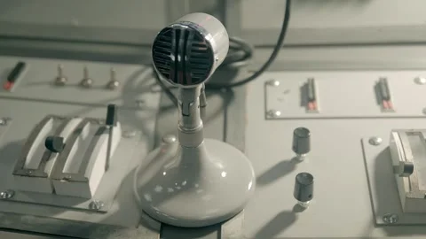 A television studio center console with old-style  microphone Video stock 323843635