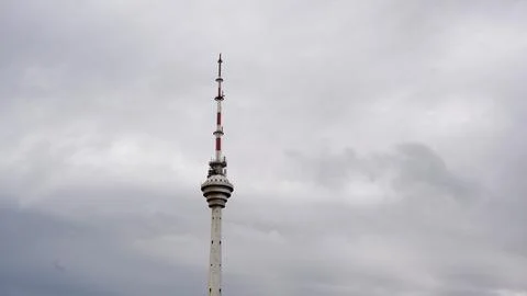 Television tower under cloudy sky Stock Photos