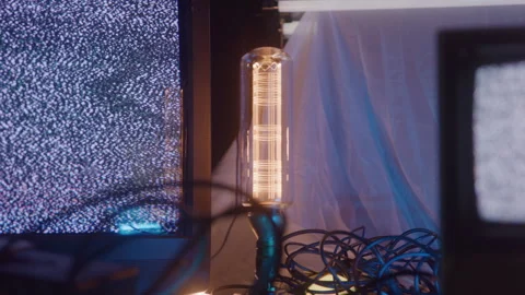 Televisions with Static Screens &amp; Cords Tangled on Floor with Interesting Stock Footage 270386285