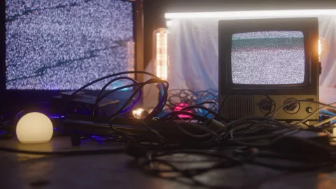 Televisions with Static Screens with Cords Tangles All Over Floor with Random Stock Footage 270334953
