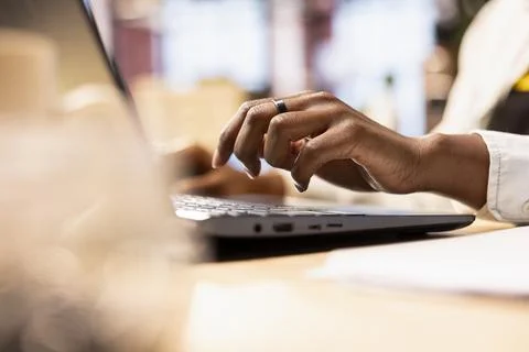 Teleworker doing computer tasks for team project in home office Foto stock