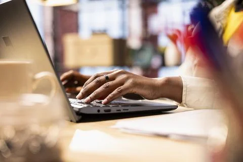 Teleworker doing computer tasks for team project in home office Foto stock