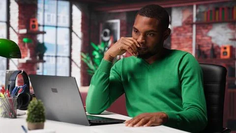 Teleworker fixing his back posture and suffering a muscle cramp at home desk Stock Photos