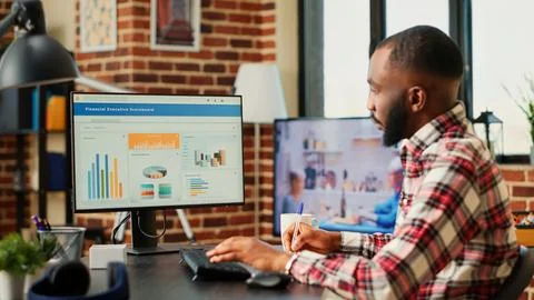 Teleworker optimizing business tasks Stock Photos