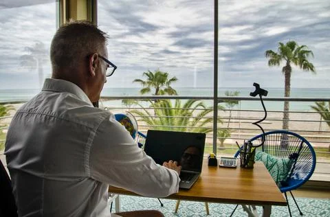 Teleworking from the beach Stock Photos